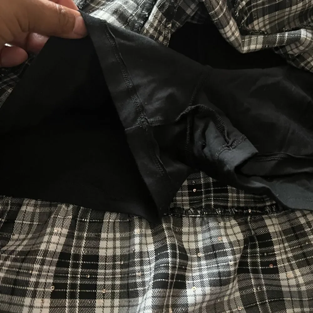 Kidpik Plaid Skirt with attached shorts and bow detail; zipper closure